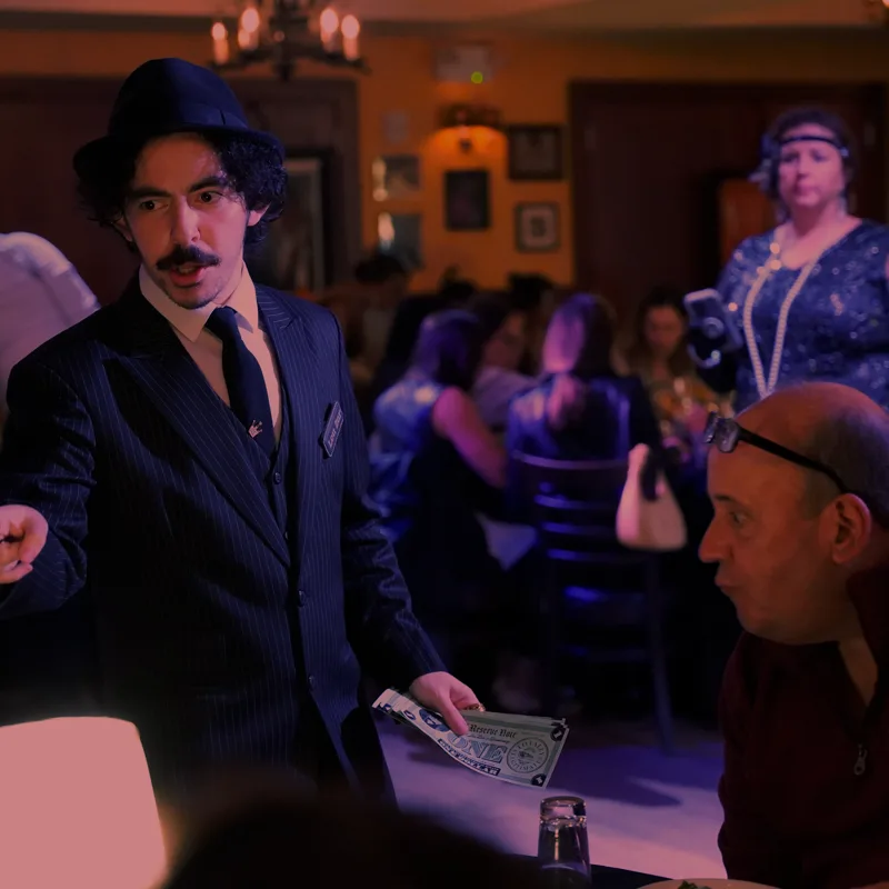 A detective questioning a guest at a Orange County show