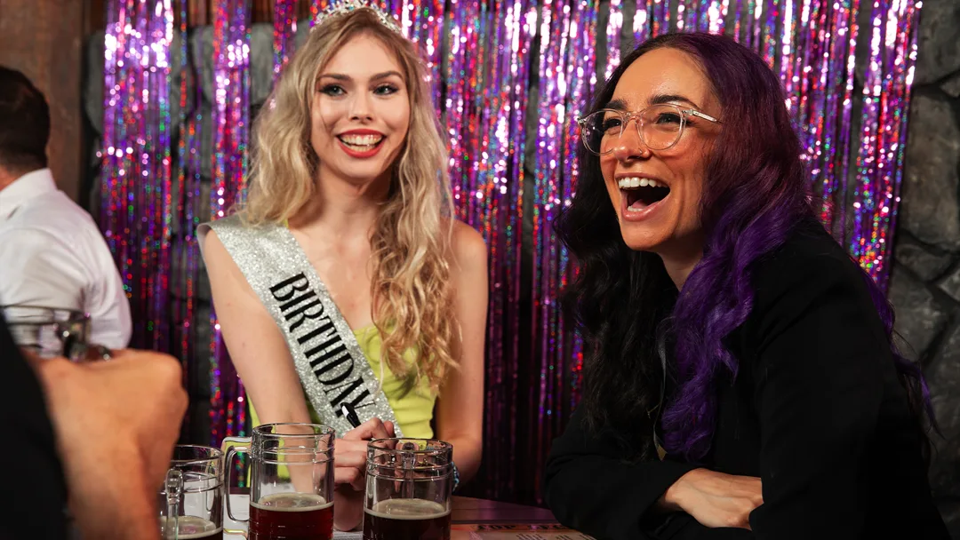 Guests celebrating at a Orange County murder mystery party