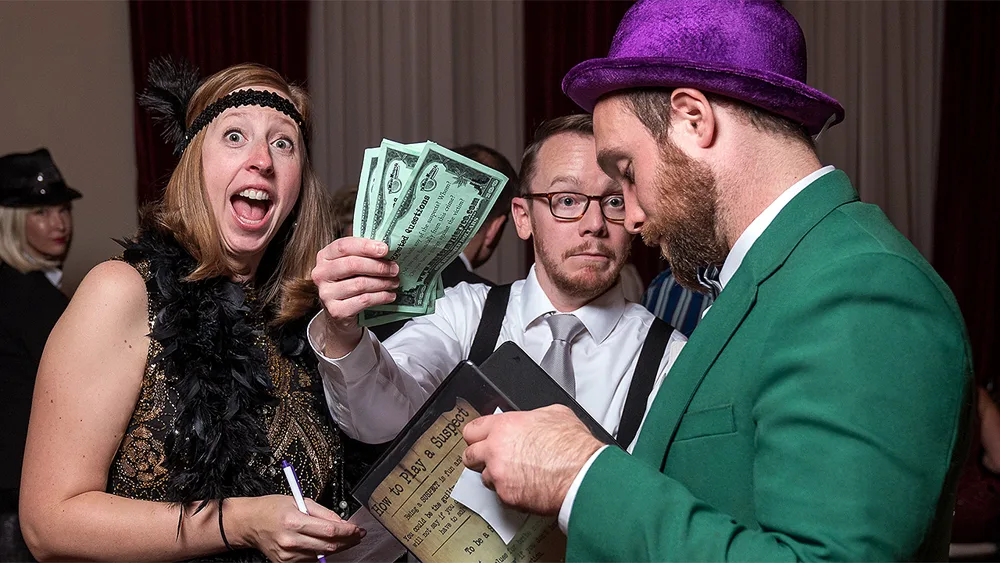 Guests enjoying a Orange County murder mystery party